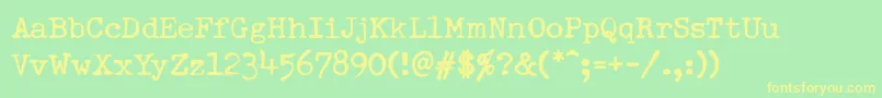 DumboldtypewriterNormal Font – Yellow Fonts on Green Background