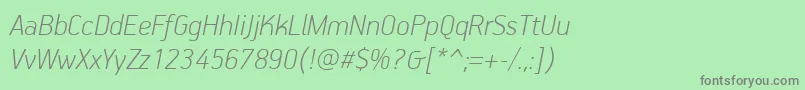 PfhandbookproThinitalic-fontti – harmaat kirjasimet vihreällä taustalla