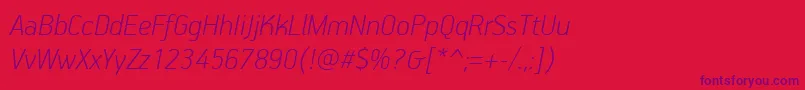 Czcionka PfhandbookproThinitalic – fioletowe czcionki na czerwonym tle