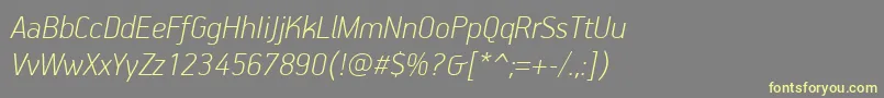 PfhandbookproThinitalic-fontti – keltaiset fontit harmaalla taustalla