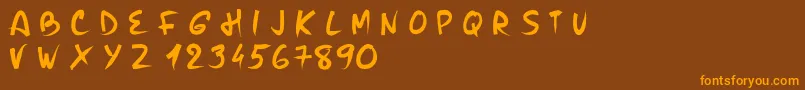 PwBrushMe-Schriftart – Orangefarbene Schriften auf braunem Hintergrund