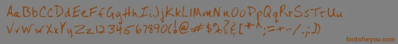 フォントLehn243 – 茶色の文字が灰色の背景にあります。