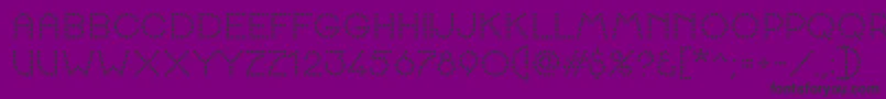 K22SpottyFace Font – Black Fonts on Purple Background