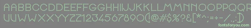 K22SpottyFace Font – Green Fonts on Gray Background