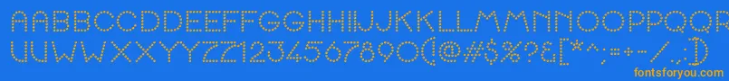 K22SpottyFace Font – Orange Fonts on Blue Background