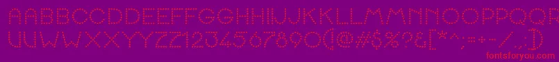 K22SpottyFace Font – Red Fonts on Purple Background