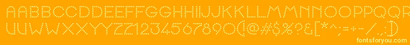 K22SpottyFace Font – Yellow Fonts on Orange Background