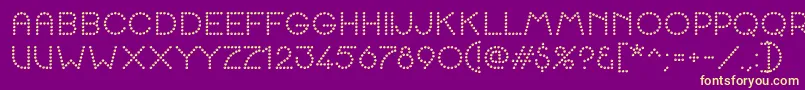 K22SpottyFace Font – Yellow Fonts on Purple Background