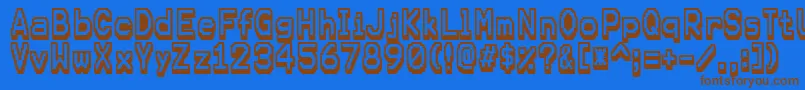 フォントKarmafuture – 茶色の文字が青い背景にあります。