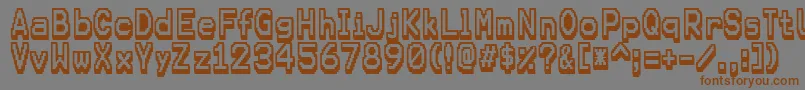 Karmafuture Font – Brown Fonts on Gray Background