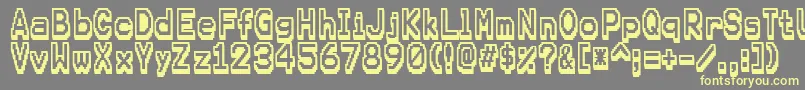 Karmafuture Font – Yellow Fonts on Gray Background