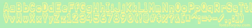 Karmafuture Font – Yellow Fonts on Green Background