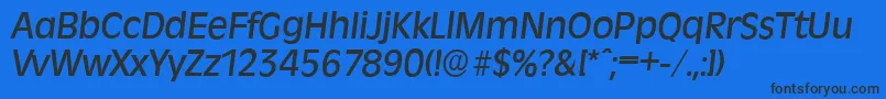 Czcionka RavennaserialMediumItalic – czarne czcionki na niebieskim tle