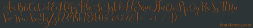 Cestlaisabellyalt Font – Brown Fonts on Black Background