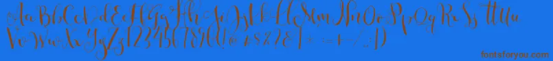 Cestlaisabellyalt Font – Brown Fonts on Blue Background