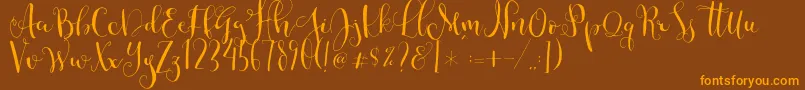 Cestlaisabellyalt Font – Orange Fonts on Brown Background