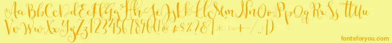 Cestlaisabellyalt-Schriftart – Orangefarbene Schriften auf gelbem Hintergrund