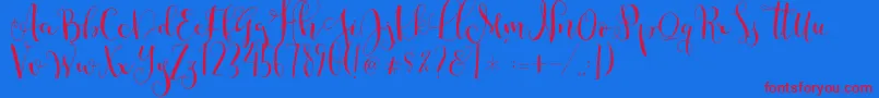 Cestlaisabellyalt Font – Red Fonts on Blue Background