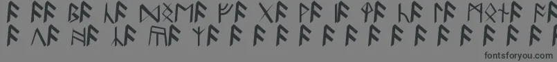 フォントBritannianRunes – 黒い文字の灰色の背景