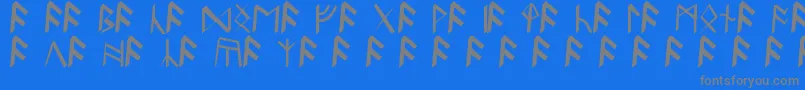 BritannianRunes-fontti – harmaat kirjasimet sinisellä taustalla