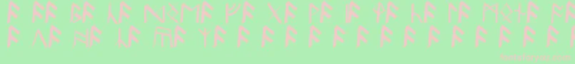 フォントBritannianRunes – 緑の背景にピンクのフォント