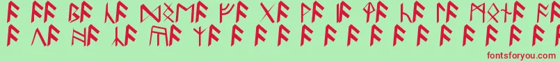 フォントBritannianRunes – 赤い文字の緑の背景