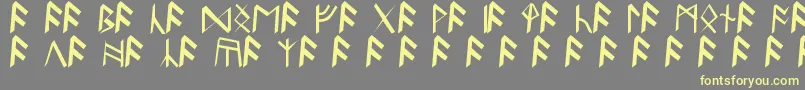 フォントBritannianRunes – 黄色のフォント、灰色の背景