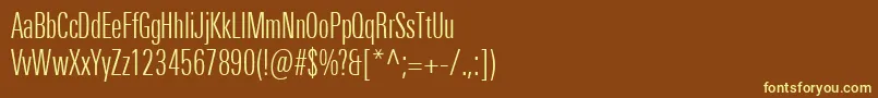 UniversNextProLightCompressed-fontti – keltaiset fontit ruskealla taustalla