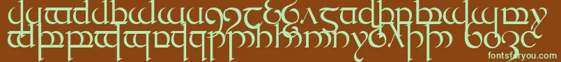 フォントQuencap1 – 緑色の文字が茶色の背景にあります。