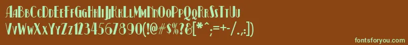 フォントKismetnf – 緑色の文字が茶色の背景にあります。