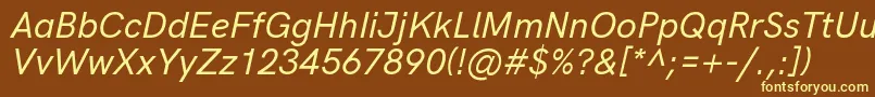 HkgroteskMediumitalic Font – Yellow Fonts on Brown Background