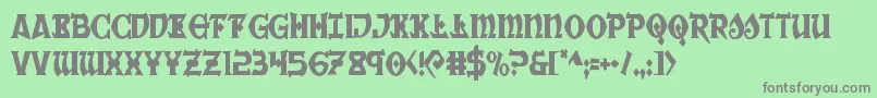Warpriestcond-Schriftart – Graue Schriften auf grünem Hintergrund