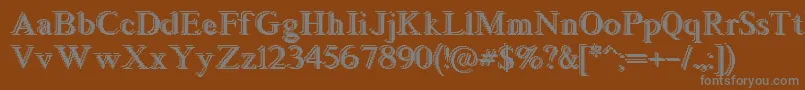 Blockstepped-fontti – harmaat kirjasimet ruskealla taustalla