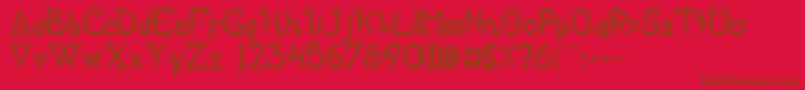 KanaRegular-Schriftart – Braune Schriften auf rotem Hintergrund