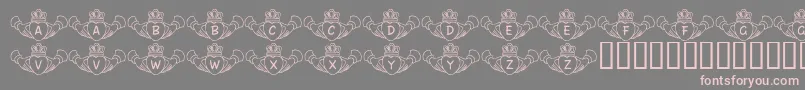 FlCladdagh-Schriftart – Rosa Schriften auf grauem Hintergrund