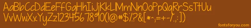 Police Kgpiecebypiece – polices orange sur fond brun