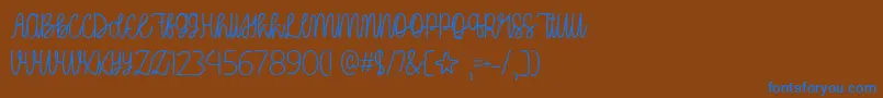 OhMyItsJulyTtf-Schriftart – Blaue Schriften auf braunem Hintergrund