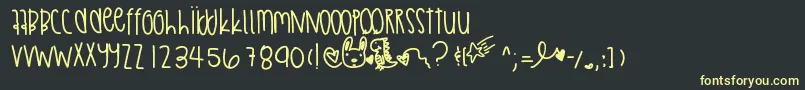 フォントAbstractthing – 黒い背景に黄色の文字