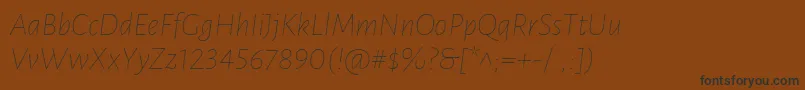 LunasansThinitalic Font – Black Fonts on Brown Background