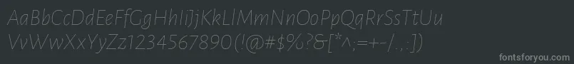 Czcionka LunasansThinitalic – szare czcionki na czarnym tle