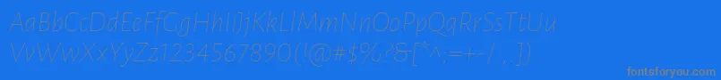 LunasansThinitalic Font – Gray Fonts on Blue Background