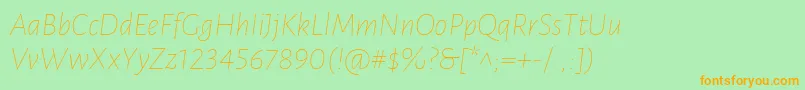 LunasansThinitalic-Schriftart – Orangefarbene Schriften auf grünem Hintergrund
