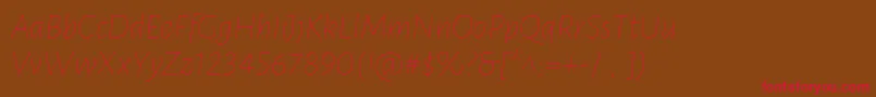 LunasansThinitalic-Schriftart – Rote Schriften auf braunem Hintergrund