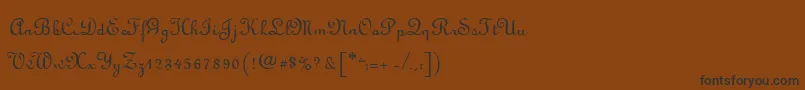 フォントLyranoRegular – 黒い文字が茶色の背景にあります