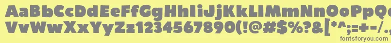フォントBumpo – 黄色の背景に灰色の文字