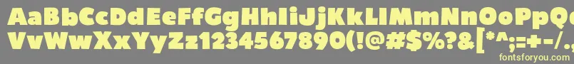 Bumpo Font – Yellow Fonts on Gray Background
