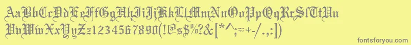 Mariageantd-fontti – harmaat kirjasimet keltaisella taustalla