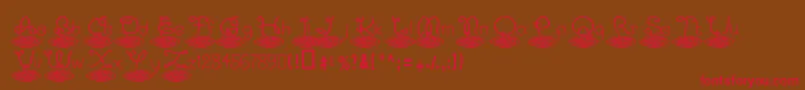 Kapastaaldente-Schriftart – Rote Schriften auf braunem Hintergrund