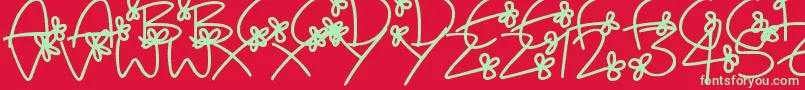 More about FlowingFlowers Font FlowingFlowers Font – Green Fonts on Red Background