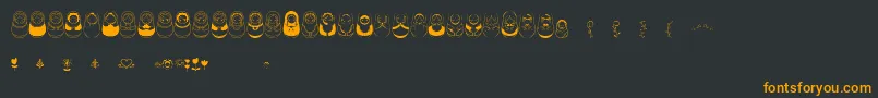 Matriochkas Font – Orange Fonts on Black Background